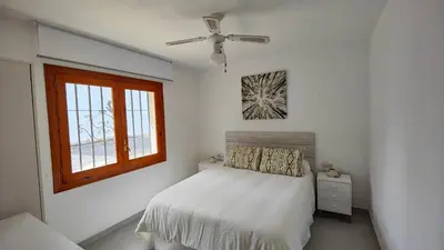 Cama o camas de una habitación en La Casita Blanca