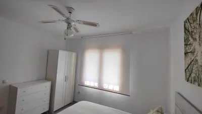 Cama o camas de una habitación en La Casita Blanca