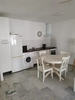 Una cocina o zona de cocina en La Casita Blanca