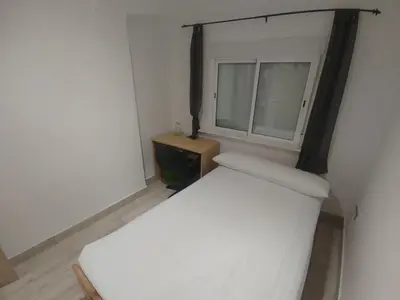 Cama o camas de una habitación en Zapillo Jaul sin ascensor