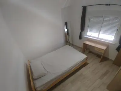 Cama o camas de una habitación en Zapillo Jaul sin ascensor