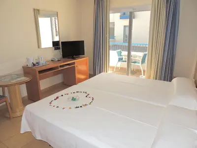 Cama o camas de una habitación en Hotel Punta del Cantal