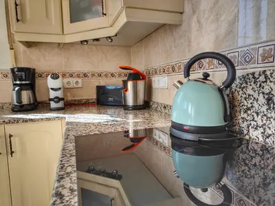 Una cocina o zona de cocina en Villa Alta Vista
