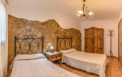 Cama o camas de una habitación en Nice Home In Mecina Bombarón With Wifi