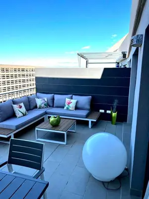 Un balcón o terraza de Atico Duplex en Playa Serena