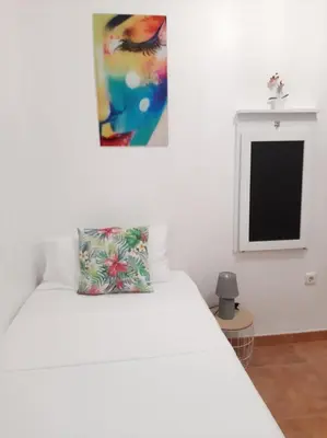 Cama o camas de una habitación en Habitación Avileña Tropical en Aguadulce