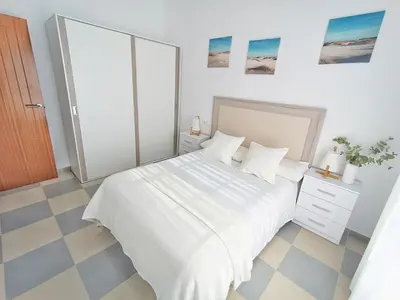 Cama o camas de una habitación en Apartamento Esbamar