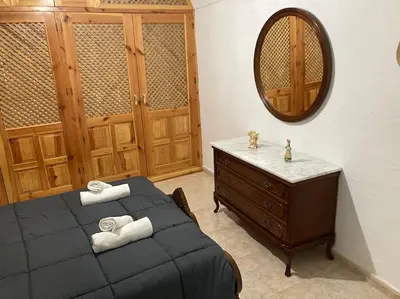 Cama o camas de una habitación en Casa Cueva Rural Estación de Guadix