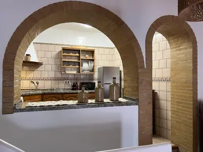 Una cocina o zona de cocina en La Casa del San Antón