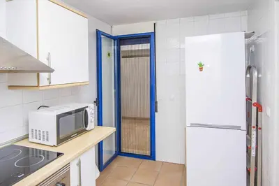 Una cocina o zona de cocina en Las Marinicas -Primera línea de la playa-