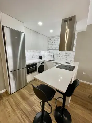 Una cocina o zona de cocina en Apartamentos Playa Ventilla
