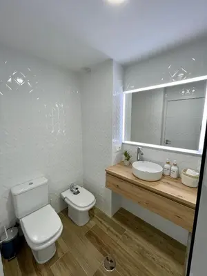 Un baño de Apartamentos Playa Ventilla