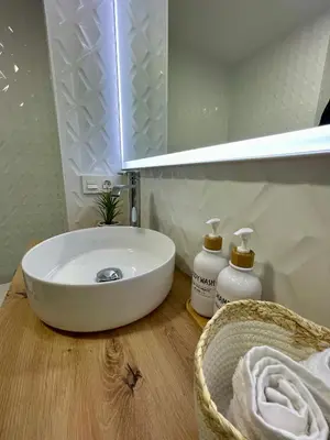 Un baño de Apartamentos Playa Ventilla