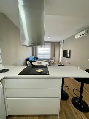 Una cocina o zona de cocina en Apartamentos Playa Ventilla