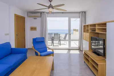 Una televisión o centro de entretenimiento en El Horizonte (Piscina,Terraza y Vistas)