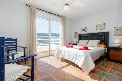 Cama o camas de una habitación en Villa Luz del Puerto