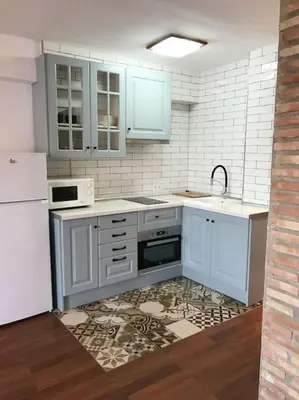 Una cocina o zona de cocina en Bonito apartamento con vistas al mar
