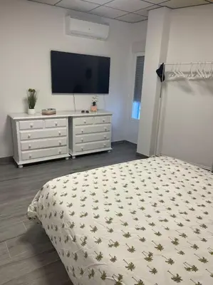 Cama o camas de una habitación en Casita coqueta en Agua Amarga