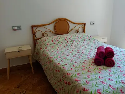 Cama o camas de una habitación en Rentaly Holidays Playa Villaricos