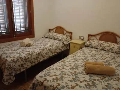 Cama o camas de una habitación en Rentaly Holidays Playa Villaricos