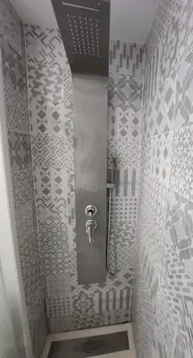 Un baño de Estudio en Urbanización naturista con piscina junto al mar