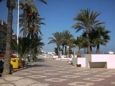 Plano de Homes of Spain, Apartamentos Paraiso , Ed Palmerston, Atico K a pie de playa, piscina privada en solarium, WiFi