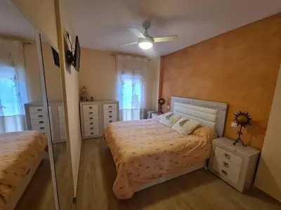 Cama o camas de una habitación en Apartamento cerca del mar