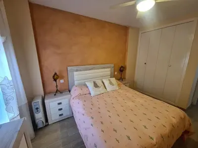Cama o camas de una habitación en Apartamento cerca del mar