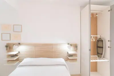 Cama o camas de una habitación en THE SUN