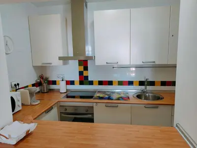 Una cocina o zona de cocina en Primera línea de playa Naturista