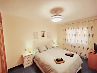 Cama o camas de una habitación en Primera línea de playa Naturista