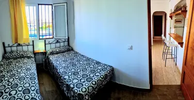 Cama o camas de una habitación en Ático piscina Veramar 5 Vera Playa primera línea de playa