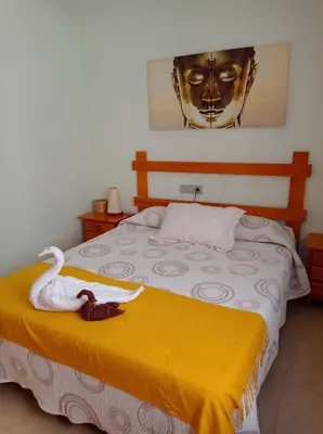 Cama o camas de una habitación en Luz de Mar.