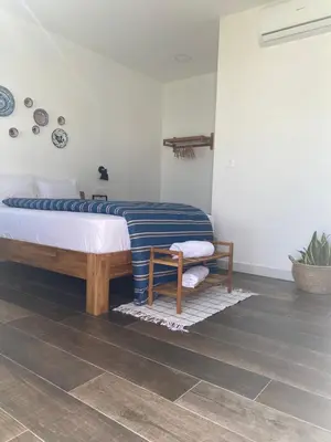 Cama o camas de una habitación en Mi Cortijo hotel de playa