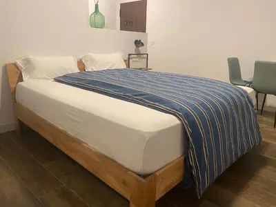 Cama o camas de una habitación en Mi Cortijo hotel de playa
