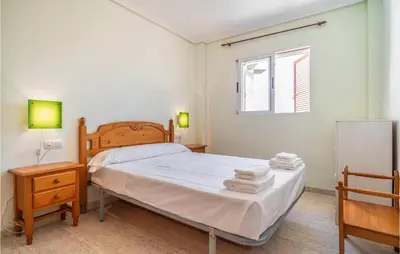 Cama o camas de una habitación en Beautiful Apartment In Playas De Vera