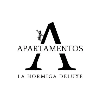 Certificado, premio, señal o documento que está expuesto en Apartamentos La Hormiga Deluxe