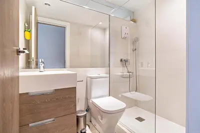 Un baño de BUNGALOW PIE DE PLAYA B30