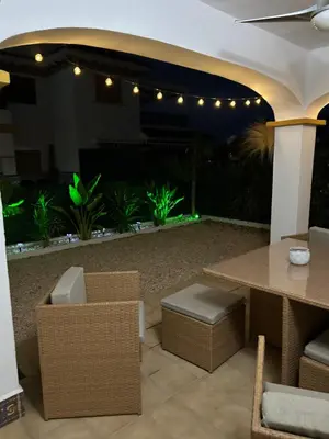 Zona de estar de Acogedor apartamento en la playa vera