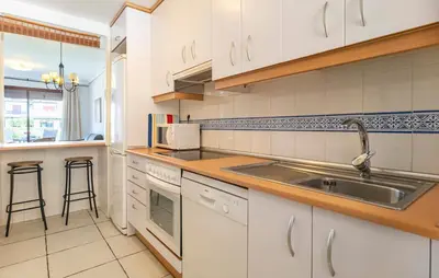 Una cocina o zona de cocina en Jardines Nuevo Vera: 1ª línea playa